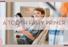 Nate Johnston via unsplash photo of boy in dentist chair thumb up and smiling with 'a tooth fairy primer' in text over top of image