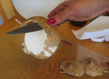Peel it with a knife, not a traditional peeler. The skin is really stringy, even though the inside is crisp and juicy.