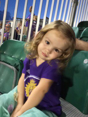 Our daughter at one of her first Orlando City soccer games.