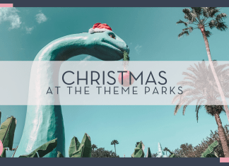 Alyssa eakin via unsplash with dinosaur with Santa hat and ornament in mouth with words 'Christmas at the theme parks' over top
