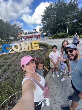 family of 6 in front of Legoland Florida