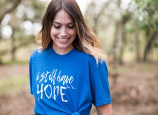 woman wearing infant loss tshirt that says I still have hope