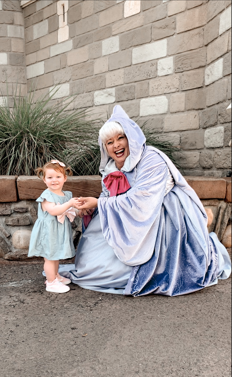 little girl meeting the fairy godmother