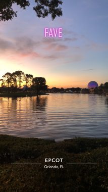 sunset over the lagoon in the middle of world showcase with spaceship earth on the right.