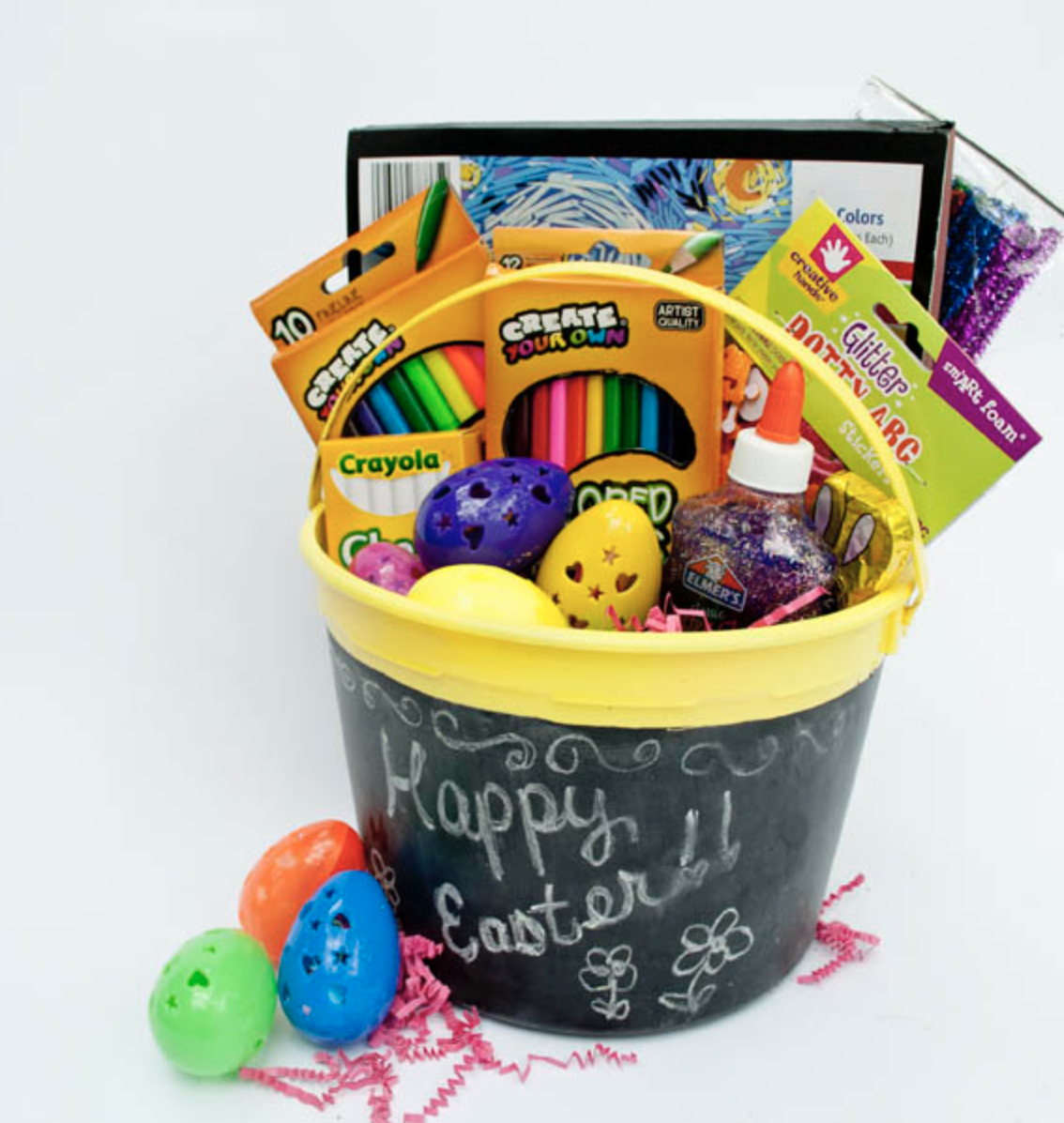 Easter Basket with a chalkboard as the pail with glue, markers, chalk and coloring books coming out of the top