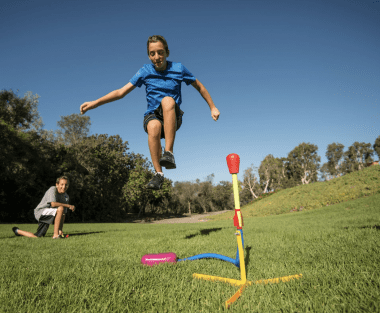 kid jumping on stomp rocket