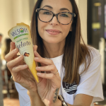 Owner of Sweet Fleet holding a vegan ice cream cone at the Plant-Based Market