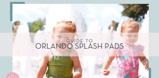 christian-bowen via unsplash photo of toddler girl in a green swim suit and toddler girl in pink and blue swim suit with water spraying behind them with words 'guide to orlando splash pads' over top