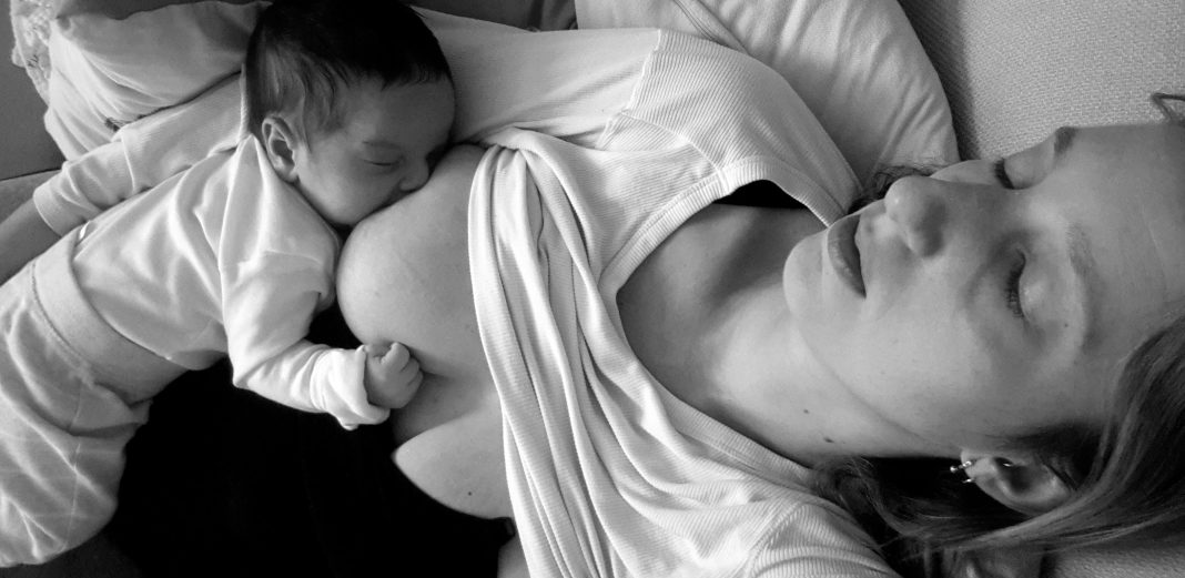 Mom breastfeeding baby.