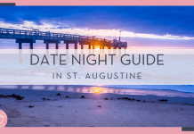 walk way over the water with the setting sun behind it with words ' date night guide in st. augustine' in text atop of it